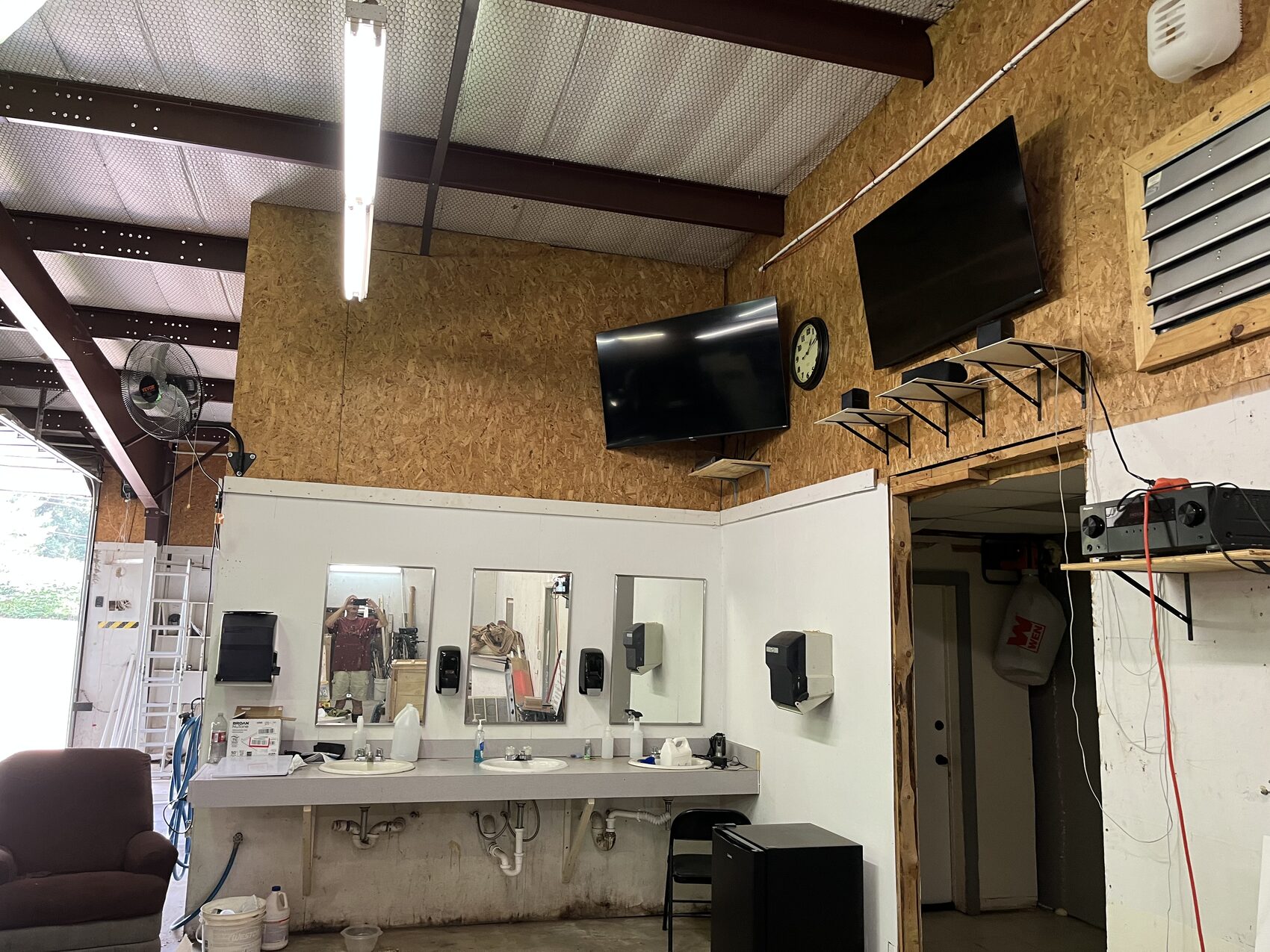 Inside the shop — production floor with laser benches