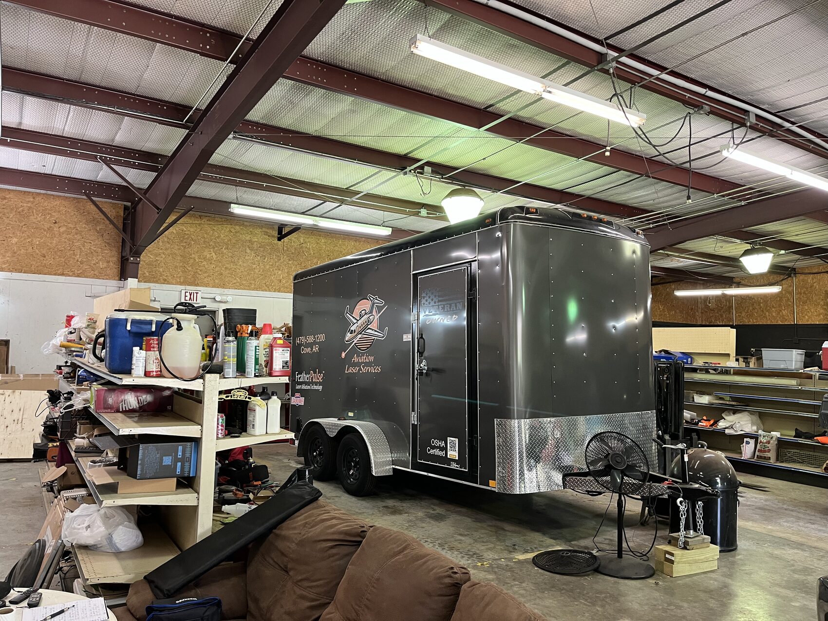 Enclosed trailer staged inside the shop